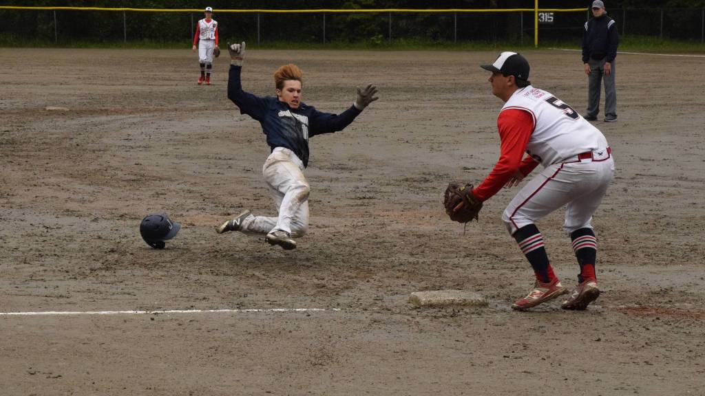 Juneau Post 25&rsquo;s Donavin McCurley slides into third base against Wasilla Saturday, June 17. Post 25 won 14-2.
