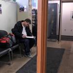 Chawn Summerall studies his paperwork at the probation department in downtown Juneau after his release from prison. (Photo courtesy of 360 North)