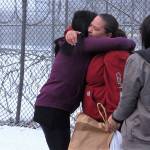 Michelle Bennett, center, is greeted by friends and family members on her release from Lemon Creek Correctional Center. PHOTO COURTESY OF 360 NORTH
