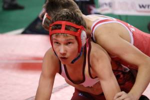 Photos courtesy of Kristie Erickson Thomas Baxter wrestles on Team Alaska in the USA Wrestling Western Regionals Meet in Pocatello, Idaho. Baxter won the triple crown at the event by taking first in his weight bracket in freestyle, Greco-Roman and folkstyle.