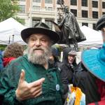 Dave Rubin, of Ketchikan, talks about the bronze statue of William Seward he designed and made with his sister, Judy, after an unveiling ceremony in the Dimond Courthouse Plaza on Monday, July 3, 2017. (Michael Penn | Juneau Empire)