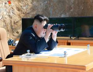 This image made from video of a news bulletin aired by North Korea&rsquo;s KRT on Tuesday, July 4, 2017, shows what was said to be North Korea leader Kim Jung Un, center, using binoculars to watch the launch of a Hwasong-14 intercontinental ballistic missile, ICBM, in North Korea&rsquo;s northwest. Independent journalists were not given access to cover the event depicted in this photo. North Korea claimed to have tested its first intercontinental ballistic missile in a launch Tuesday, a potential game-changing development in its push to militarily challenge Washington &mdash; but a declaration that conflicts with earlier South Korean and U.S. assessments that it had an intermediate range. (KRT via AP Video)