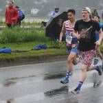 Jack White, left, and Kenny Fox begin the Glenn Frick Memorial Mile, Tuesday, July 4, 2017. (Nolin Ainsworth | Juneau Empire)