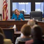 Sen. Cathy Giessel, R-Anchorage, reads one of the two versions of HB 111 dealing with oil tax credits during a Conference Committee hearing at the Capitol on Wednesday, July 12, 2017. Joining Giessel are Rep. David Talerico, R-Healy, left, and Sen. Bert Stedman, R-Sitka. The rest of the committee members was on teleconference from Anchorage. (Michael Penn | Juneau Empire)