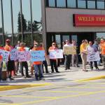 Elwood Brehmer | alaska journal of commerce Members of Laborers Local 341 in orange shirts and others supporting the Alaska oil industry rallied against House Majority proposals to raise taxes before a hearing at the Legislative Information Office in Anchorage on Wednesday.