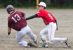 Juneau&rsquo;s Gabby Soto, right, tags Ketchikan&rsquo;s Wyatt Glenn out during their game in the Little League Junior Regional Tournament at Adair-Kennedy Memorial Park on Friday, July 14, 2017. (Michael Penn | Juneau Empire)