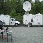 Crew members work on a joint Public Broadcasting Service/British Broadcasting Corporation project called Wild Alaska Live at the Mendenhall Glacier Visitor Center on Wednesday, July 19, 2017.