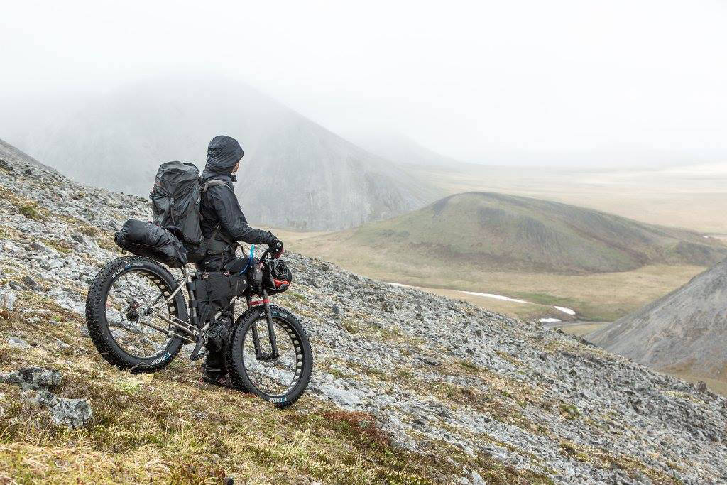 Kim McNett looks at a stretch of beach that has run out. (Photo courtesy Bj&