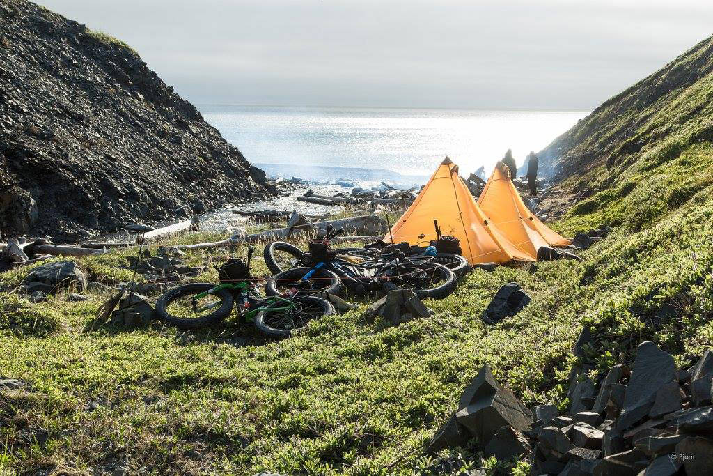 The group heads north on a firm beach &mdash; perfect riding conditions for fat bikes. (Photo courtesy Bj&