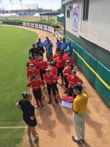 The Gastineau Channel Little League softball team prepares to have its picture taken prior to the Little League Softball West Regional Tournament. The team lost its first two games, and elimination games begin Tuesday. (Photo courtesy of Nicole Adair)