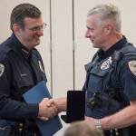 Juneau Chief of Police Bryce Johnson, left, hands out a Lifesaving Award to Officer James Esbenshade during the Juneau Police Department&rsquo;s quarterly awards ceremony on Monday, July 24, 2017. Juneau Chief of Police Bryce Johnson, left, hands out a Lifesaving Award to Officer James Esbenshade during the Juneau Police Department&rsquo;s quarterly awards ceremony on Monday, July 24, 2017.