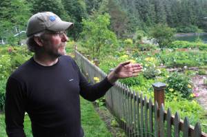 Arboretum Manager and Horticulturalist Merrill Jensen explains the changes at the Jensen-Olson Arboretum&rsquo;s vegetable garden over the years. The arboretum is celebrating 10 years this Saturday. (Alex McCarthy | Juneau Empire)