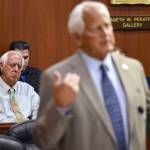 Juneau Mayor Ken Koelsch, left, listens from the House gallery as Rep. Chris Birch, R-Anchorage expresses his disappointment in money being removed from the Juneau Access Road fund during a debate on the capital budget at the Capitol on Thursday, July 27, 2017. (Michael Penn | Juneau Empire)