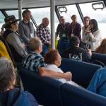 Barbara Cadiente-Nelson, a Douglas Indian Association tribal council member, introduces panel members who worked on a committee after grave sites were dug up at Gastineau Elementary School in 2012. The panel members were acknowledged during a boat trip to Taku Inlet to view traditional village sites on Friday, July 28, 2017.