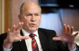 Gov. Bill Walker speaks during a 2014 interview in the Capitol. Walker signed the state&rsquo;s $1.4 billion capital construction budget on Thursday. (Michael Penn | Juneau Empire File)