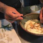 SALT Executive Chef Lionel Uddipa prepares his dish for the 2017 Great American Seafood Cookoff. Uddipa will prepare a Dungeness crab risotto to represent Alaska. (Alex McCarthy | Juneau Empire)