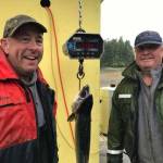 Adam Zenger, left, poses with fishing partner and Golden North Salmon Derby winner Don Zenger at the Amalga Harbor weigh station on Saturday, Aug. 12, 2017. (Courtesy Don Zenger)