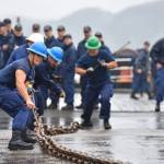 Crewmembers of the Coast Guard Cutter Henry Blake, homeported in Everett, Washington, compete in the chain pull competition during the Buoy Tender Roundup Olympics, at Coast Guard Station Juneau on Wednesday. The event was one of six skill tests the eight buoy tenders attending the Olympics competed in. (Petty Officer 1st Class Jon-Paul Rios | U.S. Coast Guard)