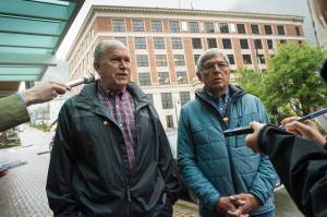 Gov. Bill Walker and Lt. Gov. Byron Mallott speak to the press after filing for re-election at the state&rsquo;s election office in Juneau on Monday, Aug. 21, 2017.