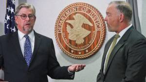 Bryan Schroder, the acting U.S. Attorney for Alaska, left, and Marlin Ritzman, the special agent in charge of the FBI office in Alaska, address reporters July 27, 2017, in Anchorage, after Kenneth Manzanares was charged in the death of his wife on board the Emerald Princess. The shape was sailing in U.S. waters, meaning the FBI investigated and charges are in the federal system. (AP Photo/Mark Thiessen)