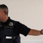 Juneau Police Department Officer Ken Colon explains security basics in regards to Aurora Harbor at the live-aboard community meeting on Thursday, Aug. 24. (Alex McCarthy | Juneau Empire)