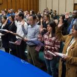 Over 30 people from around the world participate in a Naturalization Ceremony overseen by Magistrate Judge Scott Oravec of Fairbanks at the Robert Boochever Federal Courthouse in Juneau on Friday, Aug. 25, 2017. (Michael Penn | Juneau Empire)