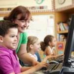 A teacher works with a student in an undated file image provided by the Alaska Department of Education. The state&rsquo;s new PEAKS standardized test revealed more than half of Alaska students are not proficient at their grade level in English, math and science. (Alaska Department of Education)
