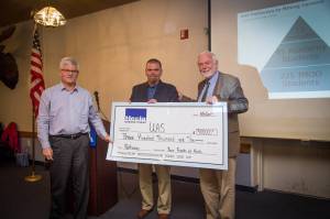 Greens Creek mine General Manager Keith Malone, left, with mine spokesperson Mike Satre, middle, and University of Alaska Southeast Chancellor Rick Caulfield at a Thursday, Aug. 31 Chamber of Commerce Luncheon. (Photo courtesy Seanna O&rsquo;Sullivan)
