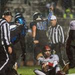 Thunder Mountain&rsquo;s Bobby Cox (40) celebrate his team&rsquo;s win as Juneau-Douglas&rsquo; quarterback Cooper Kriegmont is stopped shy of the goalline on the last play in overtime at TMHS on Friday, Sept. 1, 2017. TMHS won 10-7 in overtime. (Michael Penn | Juneau Empire)