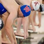 Swimmers prepare to compete during a swim meet Saturday at the Augustus Brown Swimming Pool. (Konrad Frank | For the Juneau Empire)
