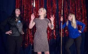 Organizer Rachael Byrd, center, shows performers Bunnicu&rsquo;La Blanc, of VivaVoom Brr-Lesque in Anchorage, left, and Bobby Pinup, of Tails & Tassels Burlesque in Homer, the stage at Gold Town Nickelodeon on Thursday, Sept. 7, 2017. Doors open for the burlesque show at 9 p.m. tonight.