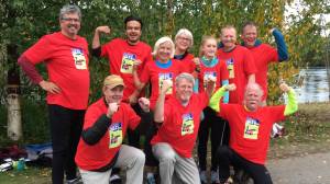 The Metcalfes and Friends team poses together as a team after completing the Klondike Trail of &lsquo;98 International Road Relay. Top row (L to R): Ken Hoff, Bienvenido Metcalfe, Patrice Parker, Kim Metcalfe, Lindsay McTague, Brian McTague, Jake Metcalfe. Front row (L to R): Bob Lohr, Peter Metcalfe, Michael Fleischhauer. (Photo courtesy of Kim Metcalfe)