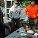 JoDean, Rory, and Jamie, on the Isis waiting for the salmon and burgers to finish grilling. (Photo by Tara Neilson)
