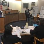State attorneys Elizabeth Bakalar, foreground left, and Margaret Paton-Walsh, foreground right, listen to arguments made by attorney Jon Choate on Thursday, Sept. 21, 2017 in Alaska Superior Court in Juneau. At background left is Judge Philip Pallenberg, who is expected to decide the Alaska Democratic Party&rsquo;s lawsuit against the state next week. (James Brooks | Juneau Empire)