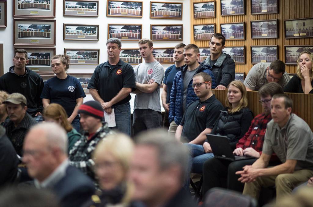 Members of International Association of Fire Fighters Local 4303 attend Monday, Sept. 18, 2017, Assembly meeting to speak to Assembly members about their concern in the number of career firefighters working in Juneau. (Michael Penn | Juneau Empire)
