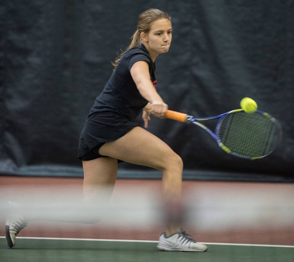 Junior Erica Hurtte returns a backhand against sophmore Olivia Moore during their Southeast Regional Tournament match at JRC/The Alaska Club on Thursday, Sept. 21, 2017. Hurtte won the match 8-1. (Michael Penn | Juneau Empire)
