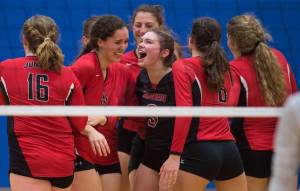 Juneau-Douglas players celebrate their win over Thunder Mountain at TMHS last month. Both JDHS and TMHS are playing in the J.I.V.E. tournament this weekend in the JDHS main gym. (Michael Penn | Juneau Empire File)