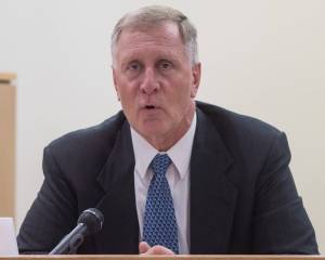 Robert J. Shem, a retired firearms examiner for the state of Alaska crime lab, speaks from the witness chair during the Christopher Strawn&rsquo;s trial in Juneau Superior Court on Friday, Oct. 13, 2017. Strawn, 34, faces charges of first-degree and second-degree murder, manslaughter, criminally negligent homicide, third-degree assault and weapons misconduct in the shooting death of Brandon Cook in October 2015. (Michael Penn | Juneau Empire)