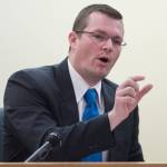 Sgt. Shawn Phelps speaks from the witness chair during Christopher Strawn&rsquo;s trial in Juneau Superior Court on Monday, Oct. 16, 2017. Strawn, 34, faces charges of first-degree and second-degree murder, manslaughter, criminally negligent homicide, third-degree assault and weapons misconduct in the shooting death of Brandon Cook in October 2015. (Michael Penn | Juneau Empire)