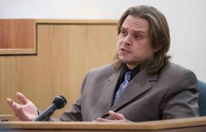 Tim Shockley, a resident of the Kodzoff Acres Mobile Home Park, answers questions by Christopher Strawn during Strawn&rsquo;s trial in Juneau Superior Court on Tuesday, Oct. 17, 2017. Strawn, 34, faces charges of first-degree and second-degree murder, manslaughter, criminally negligent homicide, third-degree assault and weapons misconduct in the shooting death of Brandon Cook in October 2015. (Michael Penn | Juneau Empire)