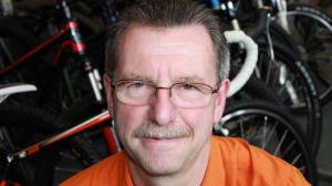 John McConnochie at Cycle Alaska, a business he purchased in 2005. (Photo courtesy of John McConnochie)