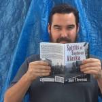James P. Devereaux poses with his book &ldquo;Spirits of Southeast Alaska.&rdquo; Image courtesy of Devereaux.
