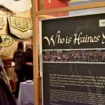 225;a is made from smelted copper and has hand-hammered chasing and repousse decoration. Other objects in this case include a grease dish, which is a small carved wooden grease dish in the shape of a seal with abalone shell eyes and three bone teeth. The rim of the bowl is inset with bone and white glass seed beads. Photo by Briana Wright.