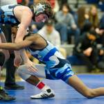 Thunder Mountain High School&rsquo;s Connor Norman, left, wrestles against teammate Jahrease Mays in the 113-pound bracket finals during the Brandon Pilot Invitational, Saturday, Oct. 21, 2017. Mays won in a 6-4 tiebreaker. (Nolin Ainsworth | Juneau Empire)