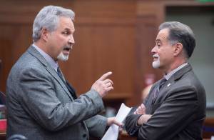 Senate President Pete Kelly, R-Fairbanks, left, and Senate Majority Leader Peter Micciche, R-Soldotna, speak before gaveling in on the first day of the fourth Special Session of the 30th Alaska Legisture on Monday, Oct. 23, 2017. (Michael Penn | Juneau Empire)