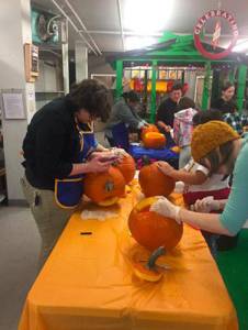 Bigs and Littles with Big Brothers Big Sisters in Juneau carve pumpkins at Don Abel&rsquo;s Pumpkin Patch. Courtesy photo.
