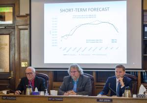 House Finance Committee members Rep. Steve Thompson, R-Fairbanks, left, Rep. David Guttenberg, D-Fairbanks, center, and Rep. Jason Grenn, NA-Anchorage, listen to Ed King, Legislative Liaison for the Department of Natural Resources, give the Preliminary 2017 Fall Production Forecast at the Capitol on Wednesday, Oct. 25, 2017. (Michael Penn | Juneau Empire)