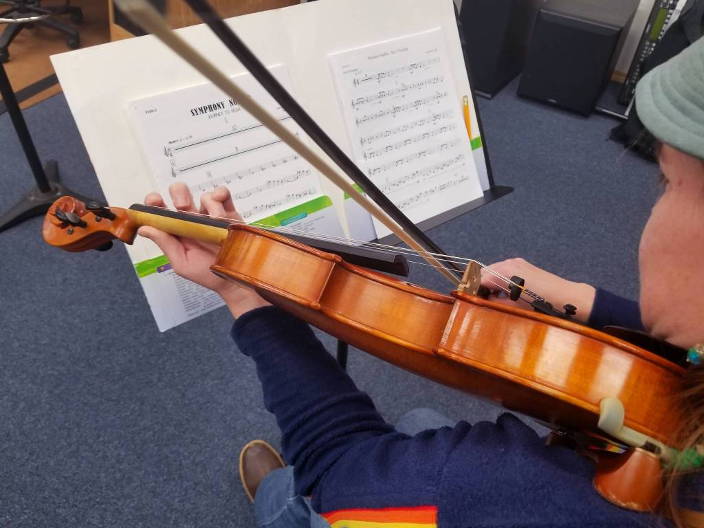 Val Snyder practices at the Amalga Chamber Orchestra rehearsal. Photo by Todd Hunt.