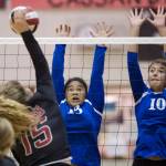 Juneau-Douglas&rsquo; Skylar Hickok, left, spikes against Thunder Mountain&rsquo;s Marissa Tanuvasa-Tuvaifale, center, and Emma Kaelke at JDHS on Friday, Oct. 27, 2017. Thunder Mountain won 16-14 in the tie-breaking fifth game. (Michael Penn | Juneau Empire)