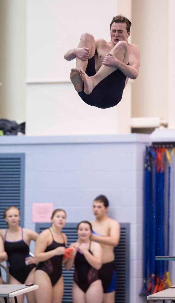 Cian Hart dives at the Southeast Alaska Regional Swim and Dive Championships at Thunder Mountain High School on Friday, Oct. 27, 2017. (Michael Penn | Juneau Empire)